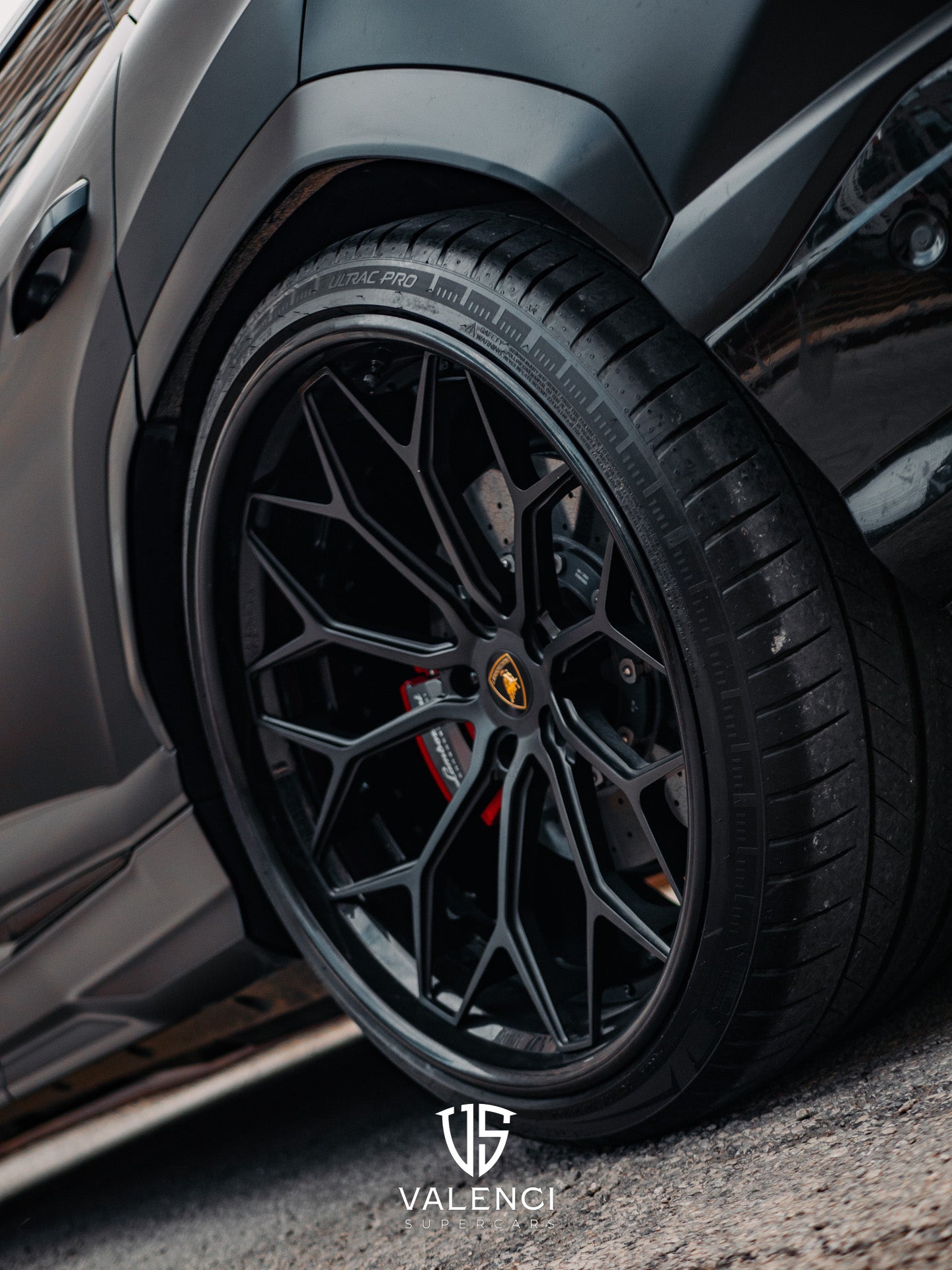 Lamborghini Urus close-up of premium alloy rims featuring sleek design, sharp detailing, and high-performance craftsmanship.