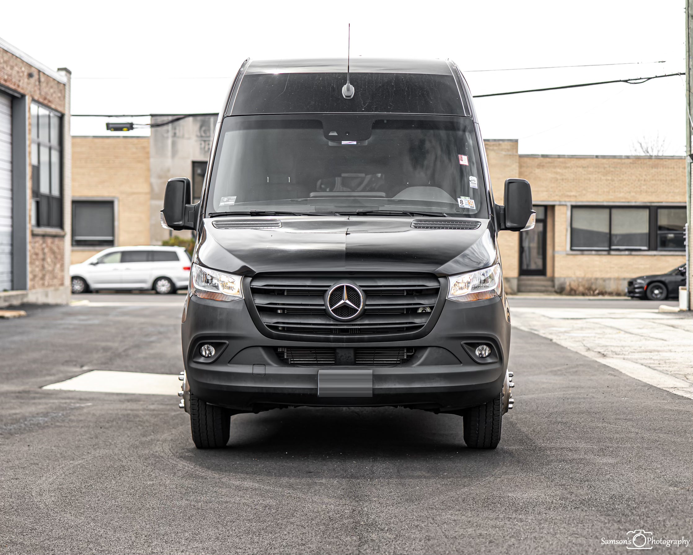 Rear cabin of Sprinter Van – leather seats and entertainment screens
