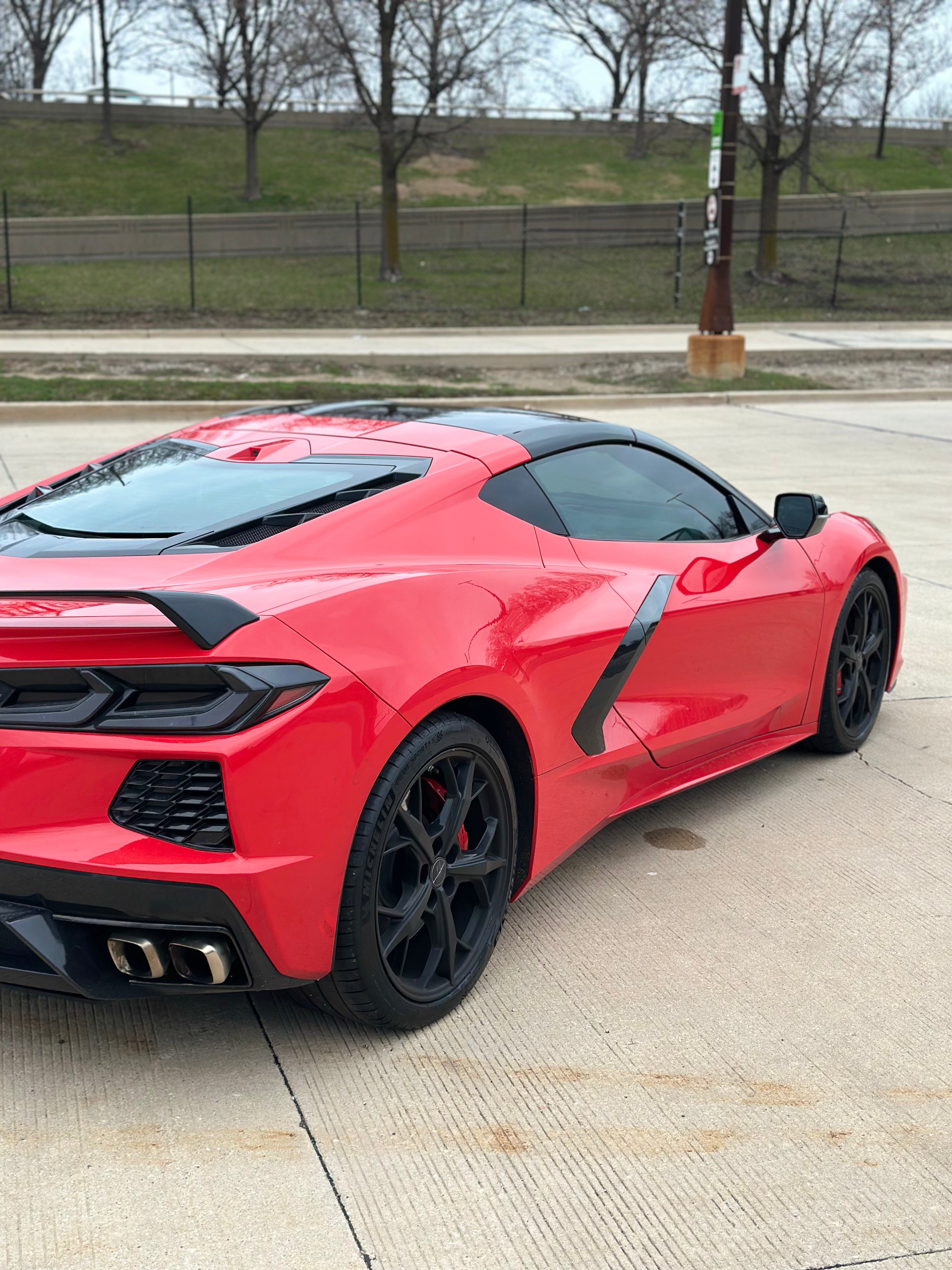 Red C8 Corvette rear wing and exhaust – exotic Car rental