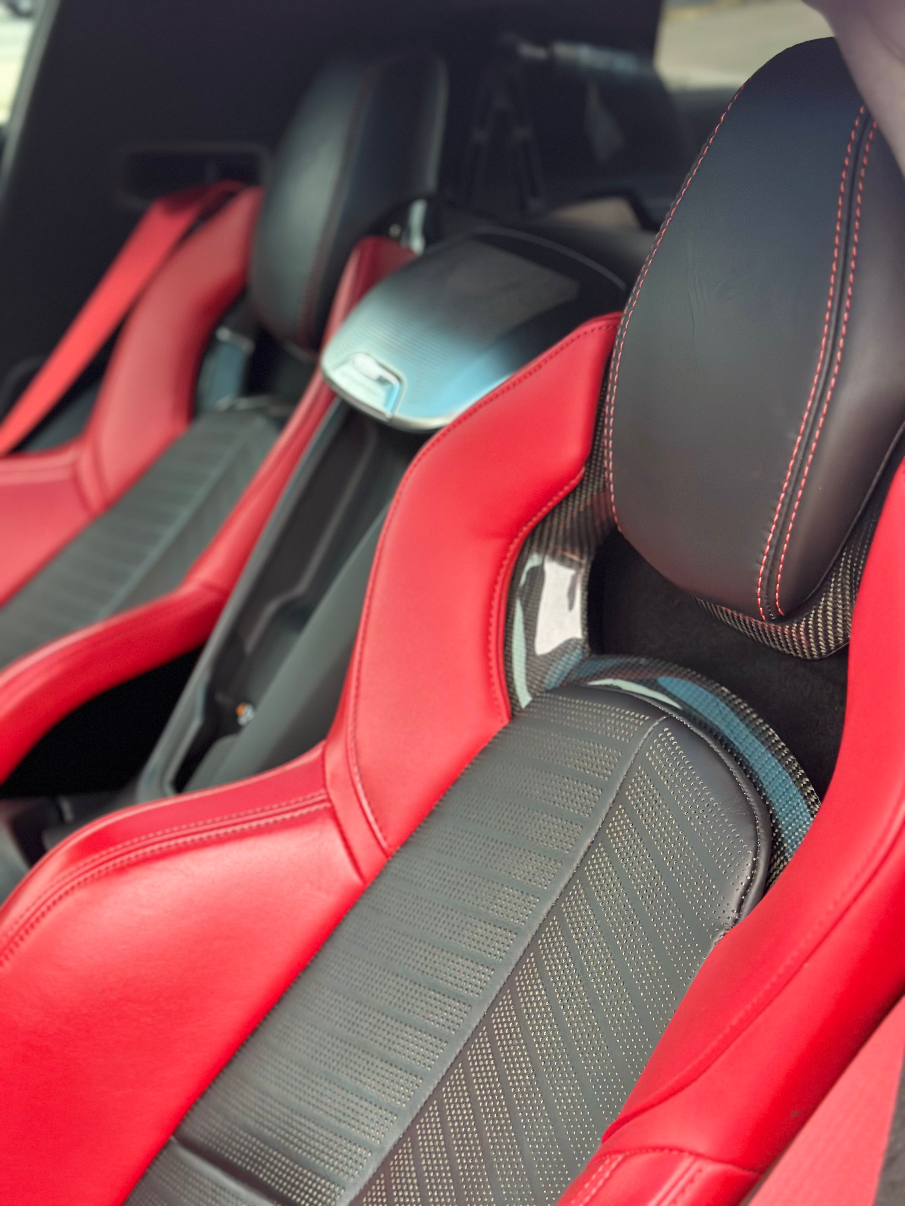 Red C8 Corvette interior – driver cockpit sports car