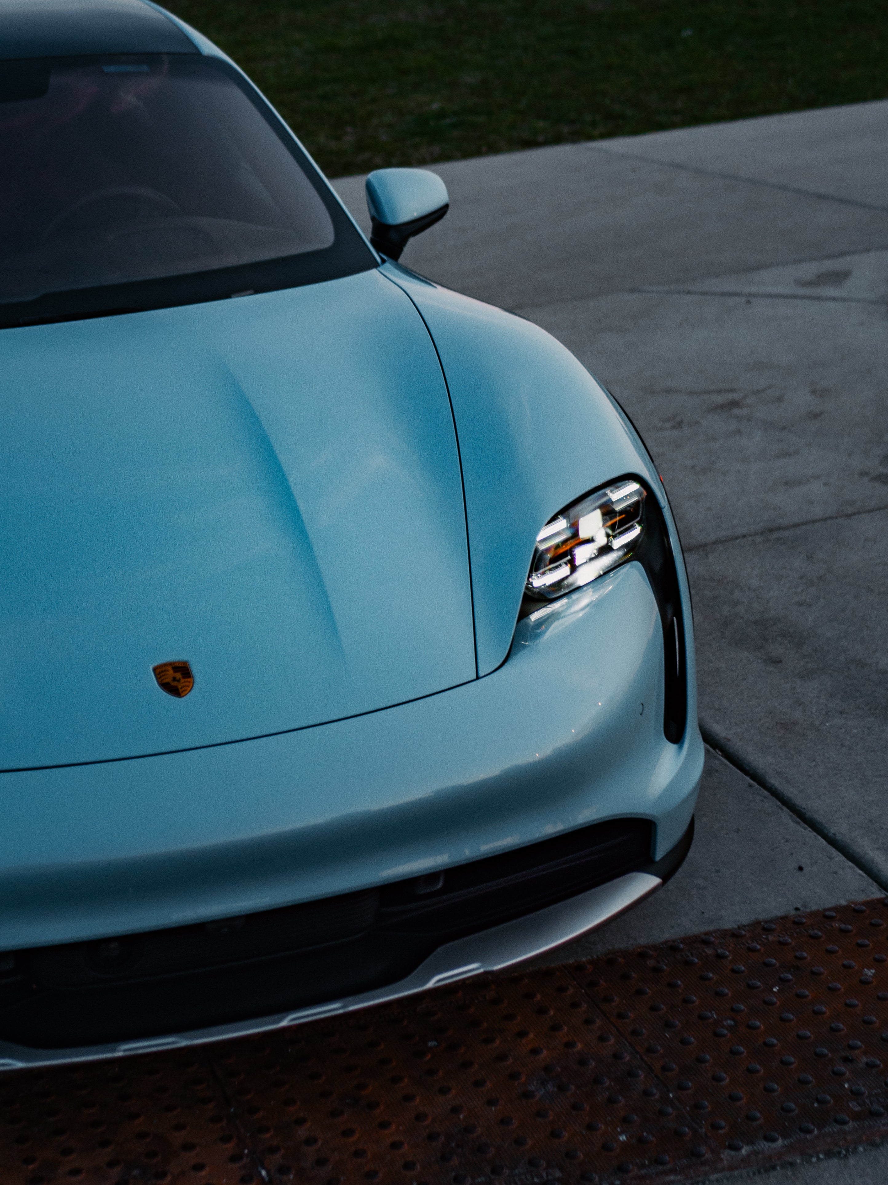 Porsche Taycan 4 baby blue exterior – electric luxury sedan rental Chicago