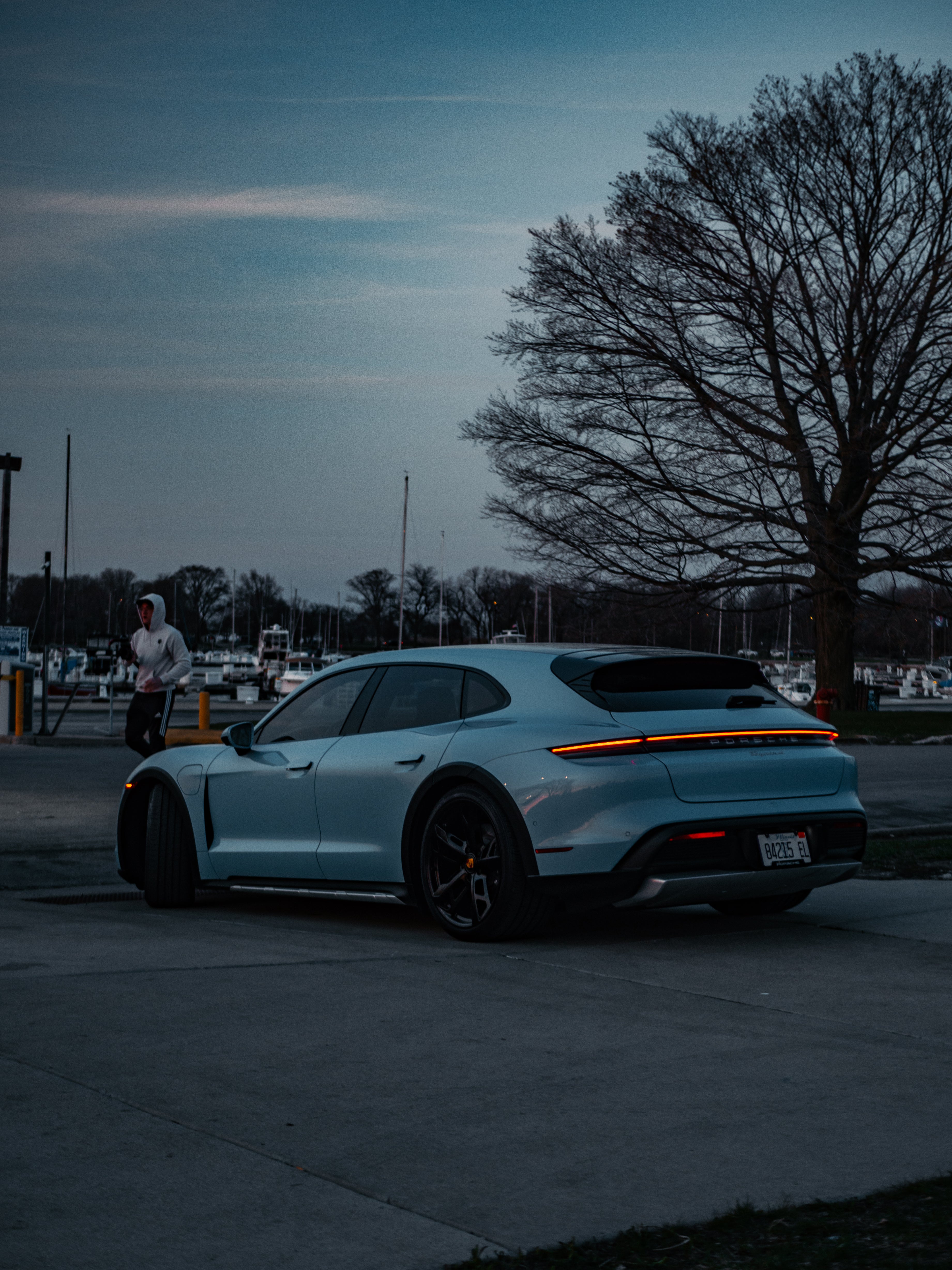 Porsche Taycan rear profile – stylish EV luxury car in Chicago